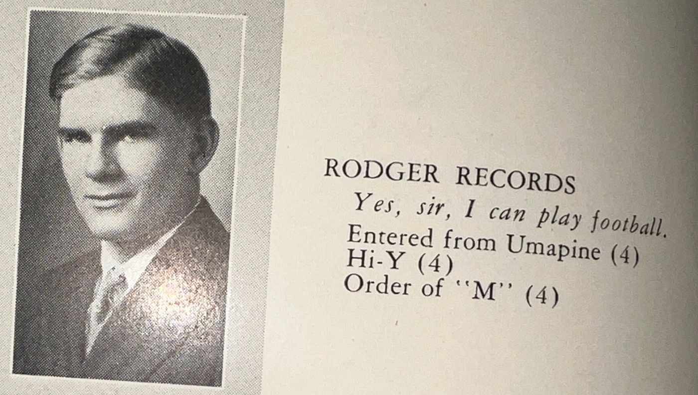 A high-school yearbook page with a young man&rsquo;s portrait and his class entry.